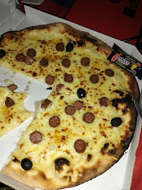 Plats et boissons du Pizzas à emporter Pizza'Man St André à Saint-André - n°7