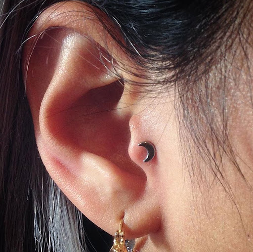 Find low back tattoo ideas for your next unique tattoo in Ozone Park at Ozone Tattoo