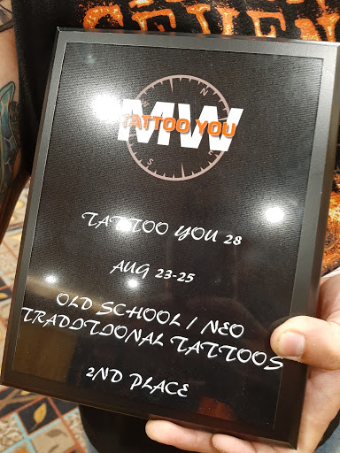 Find heart beat tattoo ideas for your next unique tattoo in Lakeview at Backwoods Tattoo Studio