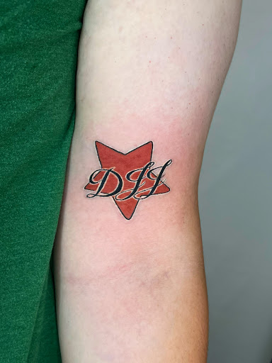 Explore fantasy book tattoo ideas, creative tattoo ideas in Amsterdam, available at Spoken Hand Tattoo