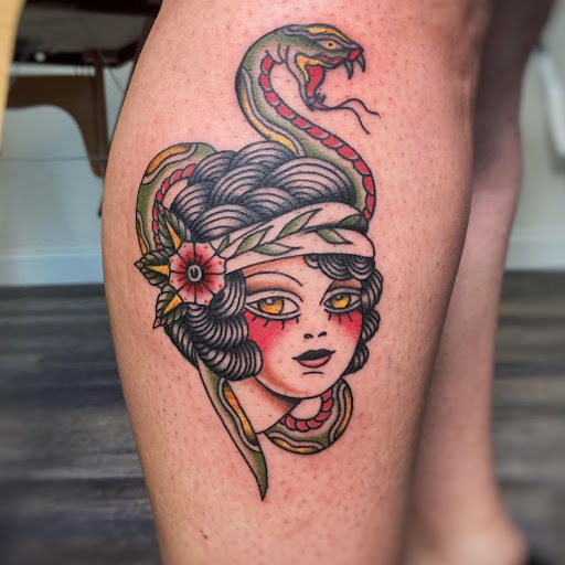 Explore black female tattoos ideas, creative tattoo ideas in Berwyn, available at Stones Throw Tattoo & Gallery