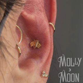 Explore clown tattoo ideas, creative tattoo ideas in Oshkosh, available at Piercings by Molly Moon at 920 Tattoo and Piercing