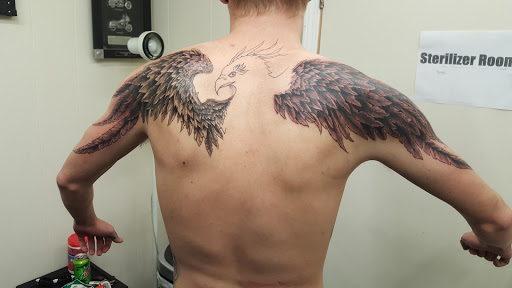 Explore manatee tattoo ideas, creative tattoo ideas in Hays, available at Fantasy Graphics Tattoo Studios