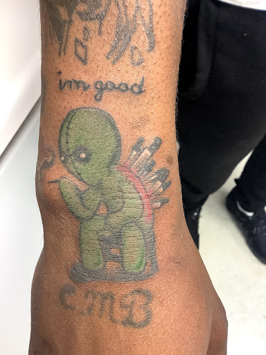 Explore 3 percent tattoo ideas, creative tattoo ideas in Turner, available at Heathen Ink