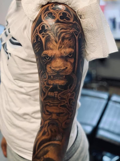 Explore guitarist tattoo ideas, creative tattoo ideas in Pocono Summit, available at Flores Tattoo