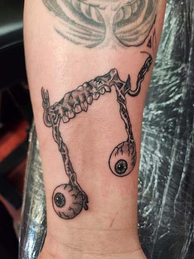 Explore science tattoo ideas, creative tattoo ideas in Inverness, available at The Perfect Spot Tattoos
