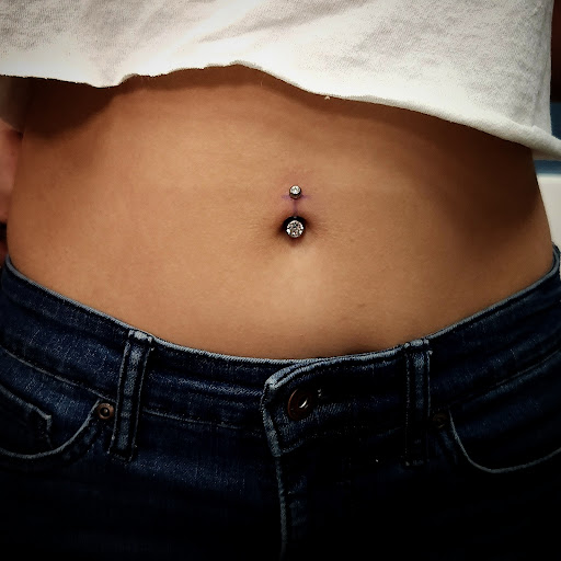 Explore cross with names tattoo ideas, creative tattoo ideas in Indianapolis, available at Bombshell Piercing Co