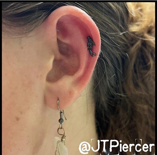 Explore tattoo ideas for arms and shoulders, creative tattoo ideas in Jupiter, available at Moth And Moon Tattoo