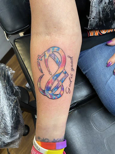 Explore book lover tattoo ideas, creative tattoo ideas in Mandan, available at Dolls Studios Tattoo & Piercing