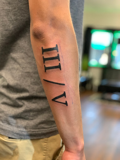 Explore tactical tattoo ideas, creative tattoo ideas in Roscoe, available at Elevated Ink Tattoo