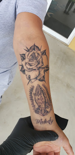 Explore mother daughter and son tattoo ideas, creative tattoo ideas in Cornelia, available at Prismatic Pulse Tattoo