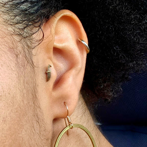 Explore feminine arm tattoo ideas, creative tattoo ideas in Chapel Hill, available at Golden Falcon Tattoo and Piercing