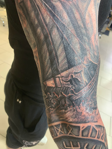 Explore tattoo cover up ideas for shoulder, creative tattoo ideas in Sarasota, available at SEVEN SINS Tattoo Studio