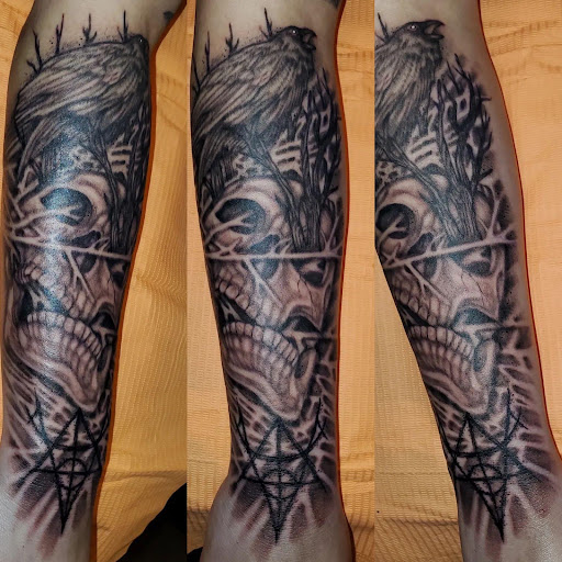 Explore tattoo ideas for dark skin guys, creative tattoo ideas in Palm Harbor, available at Angry Owl Tattoo and Piercing