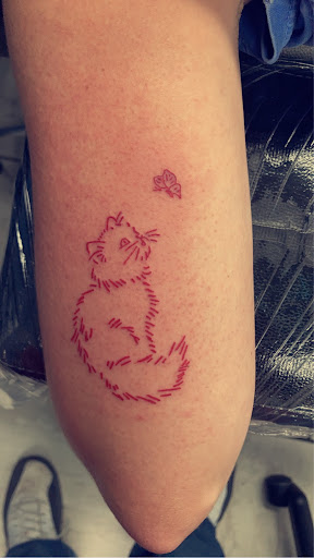 Explore back tattoo cover up ideas, creative tattoo ideas in Foley, available at Symbolic Ink Tattoo Studio