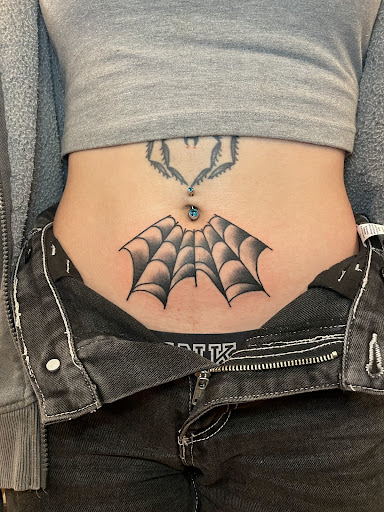 Explore wrap around tattoo ideas, creative tattoo ideas in Seattle, available at Sakoku Tattoo