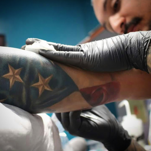 Explore barney tattoo ideas, creative tattoo ideas in Spring, available at Kreative Kingdom Tattoo Studio