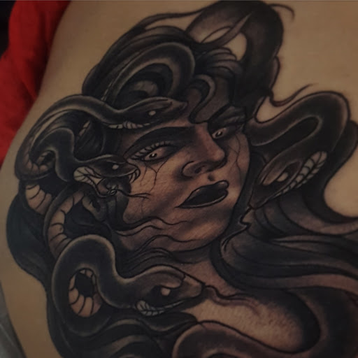 Explore dog tattoos ideas, creative tattoo ideas in Bakersfield, available at CLASSIC STANDARD TATTOO CO.