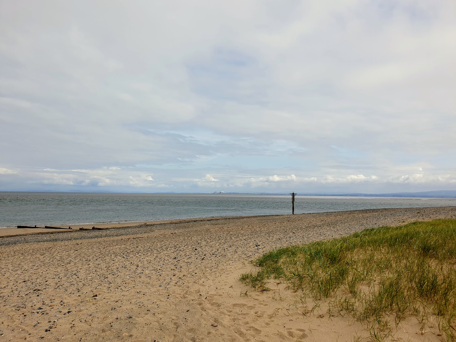 Fotografie cu Plaja Fleetwood - locul popular printre cunoscătorii de relaxare