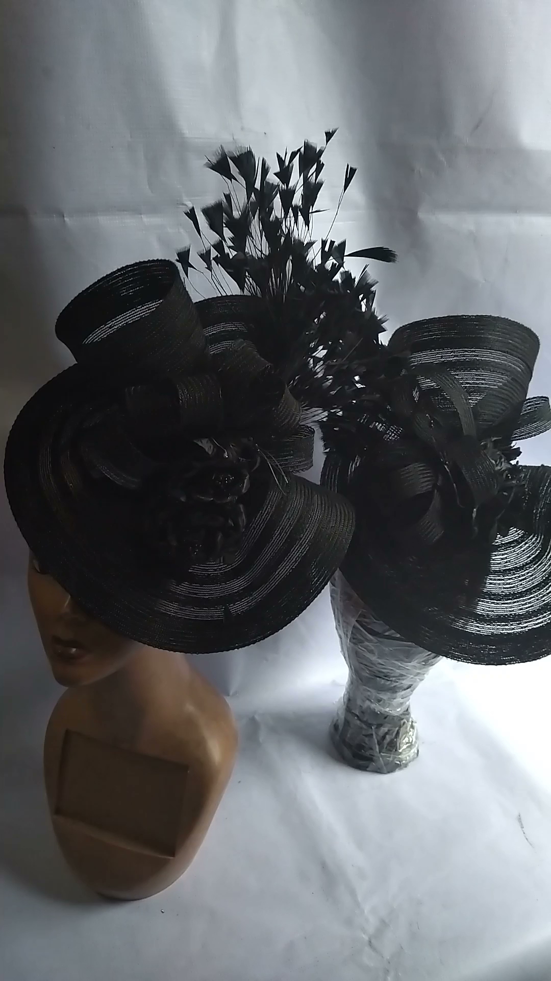 ROSES AND FEATHERS MILLINERY