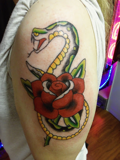 Explore dolphin tattoo ideas, creative tattoo ideas in Largo, available at Alchemy Tattoos and Body Piercings