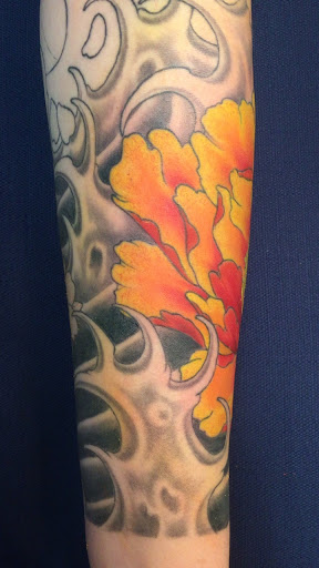 Find good leg tattoo ideas for your next unique tattoo in Seaside at Creative Visions Ink Tattoo & Body Piercing Studio - Call for Appointment