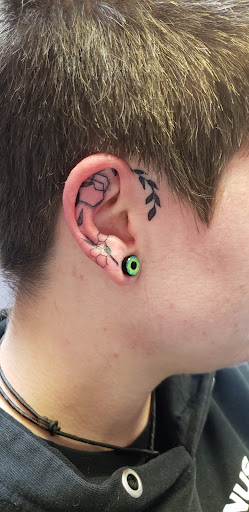 Find wave tattoo ideas for your next unique tattoo in Lockport at Tattoo City by Larry Brogan