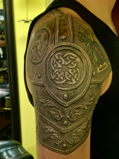 Explore scar tattoo ideas, creative tattoo ideas in East Northport, available at Tormented Souls