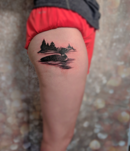 Explore iris flower tattoo ideas, creative tattoo ideas in Stowe, available at World Famous Monkey House Customs