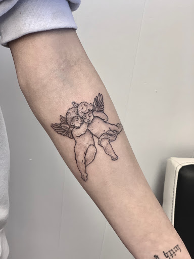 Explore small elephant tattoo ideas, creative tattoo ideas in Springfield, available at Triumph Tattoo