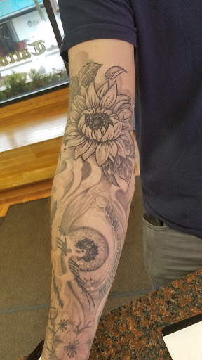 Tattoo Shop «Liquid Swordz», reviews and photos, 27 N Washington St, Ypsilanti, MI 48197, USA