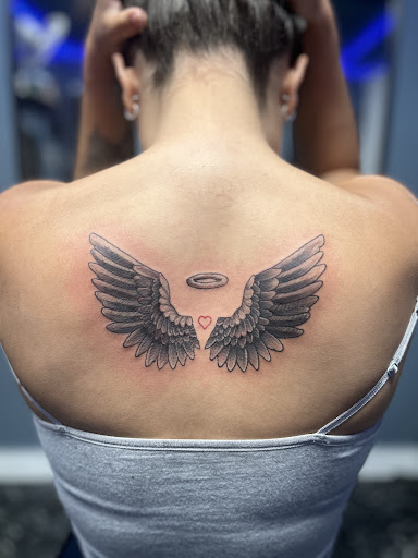 Explore mens christian tattoo ideas, creative tattoo ideas in Flint, available at Sylvertooth Tattoos & Piercings