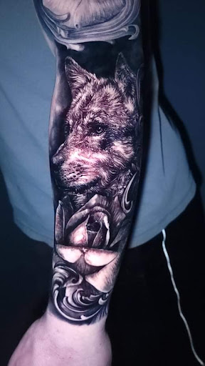 Explore calf tattoo ideas for men, creative tattoo ideas in Boise, available at Ink Slaves Tattoo