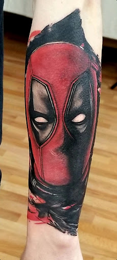 Explore motley crue tattoo ideas, creative tattoo ideas in Benton, available at Spectrum Tattoo