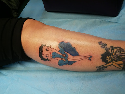 Find breast tattoo ideas for your next unique tattoo in Riverside at The Madd Tatterz Tattoo Parlor