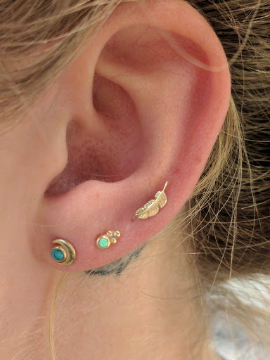 Explore tattoo ideas for the hand, creative tattoo ideas in Nashville, available at Dahlia Fine Jewelry & Body Piercing