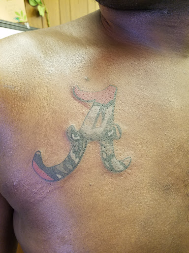 Explore men hand tattoo ideas, creative tattoo ideas in Macomb, available at Naez Ink