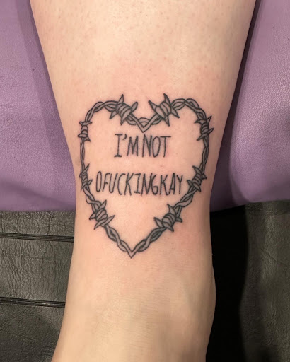 Explore tattoo ideas on back of neck, creative tattoo ideas in Cincinnati, available at Opal Moon Tattoo