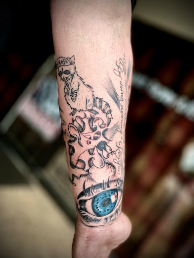 Explore red tattoo ideas women, creative tattoo ideas in Chattanooga, available at Southern Soul Tattoo & Piercing Studio