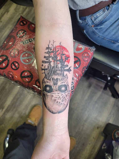 Explore female wonder woman tattoo ideas, creative tattoo ideas in Athens, available at United Ink Tattoos and Body Piercings