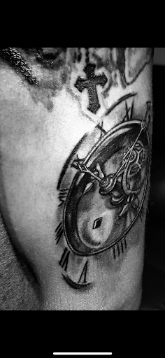 Explore tattoo ideas for leg sleeve, creative tattoo ideas in Rogers, available at Ink Solutions Tattoo