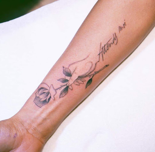 Explore forearm cross tattoo ideas, creative tattoo ideas in Venice, available at Ink Monkey Tattoo and Piercing