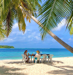 Maalhos Island Beach'in fotoğrafı - rahatlamayı sevenler arasında popüler bir yer