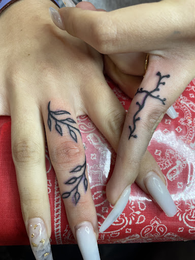 Explore tomahawk tattoo ideas, creative tattoo ideas in El Paso, available at Art of Ink Studios