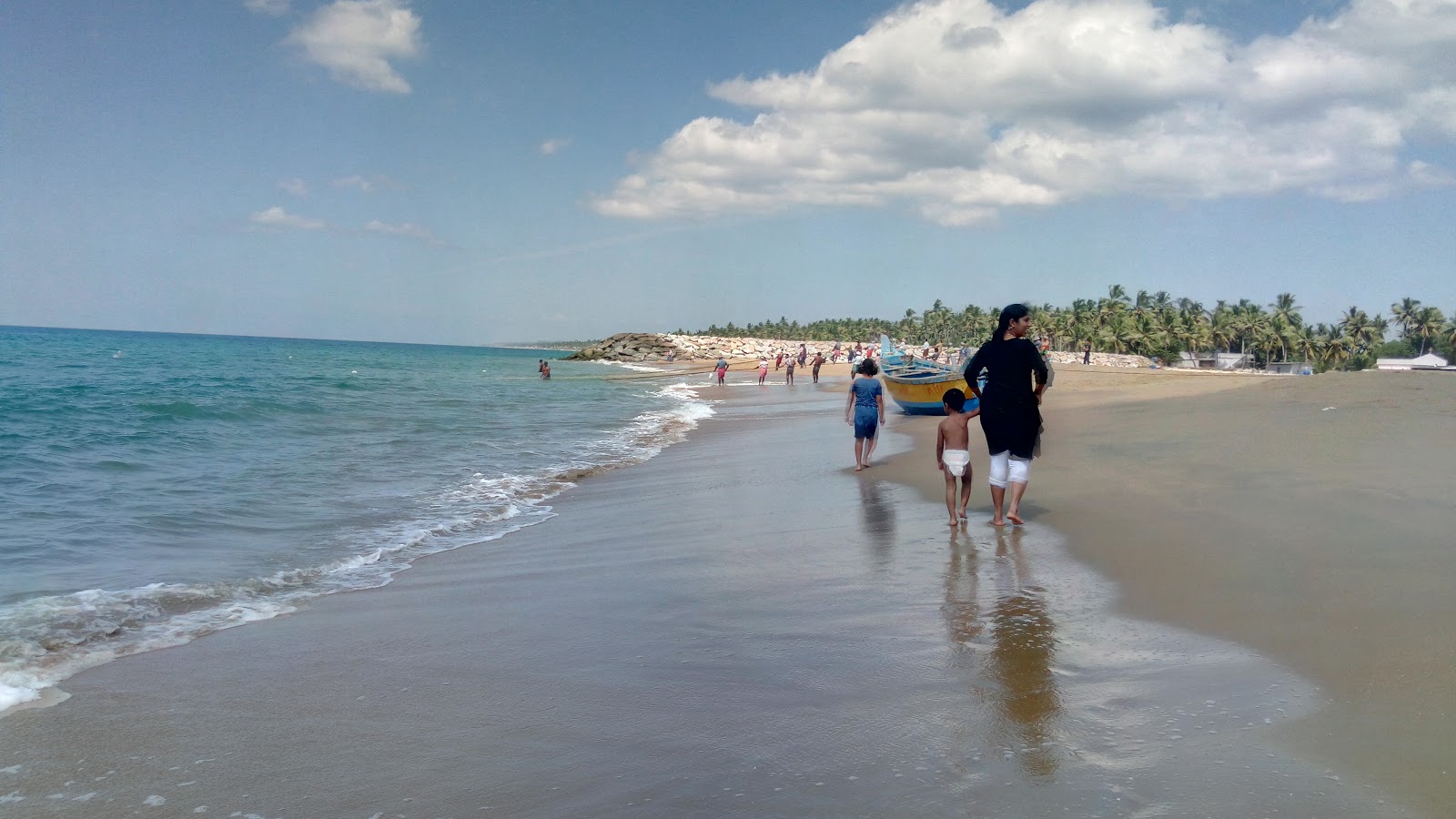 Perumathura Beach'in fotoğrafı geniş plaj ile birlikte