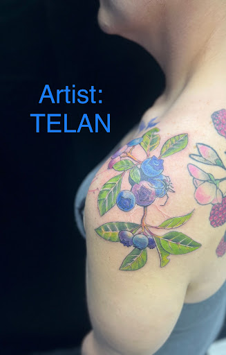 Explore hellscape sleeve tattoo ideas, creative tattoo ideas in Foley, available at Symbolic Ink Tattoo Studio