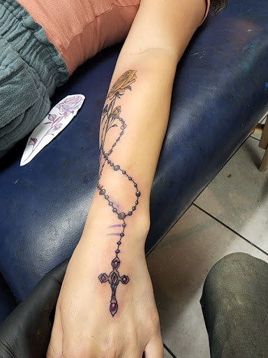 Explore stitch and angel tattoo ideas, creative tattoo ideas in Foley, available at Symbolic Ink Tattoo Studio