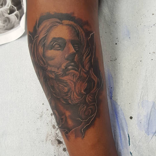 Explore tcb tattoo ideas, creative tattoo ideas in Pittsburg, available at Delta Art & Tattoo