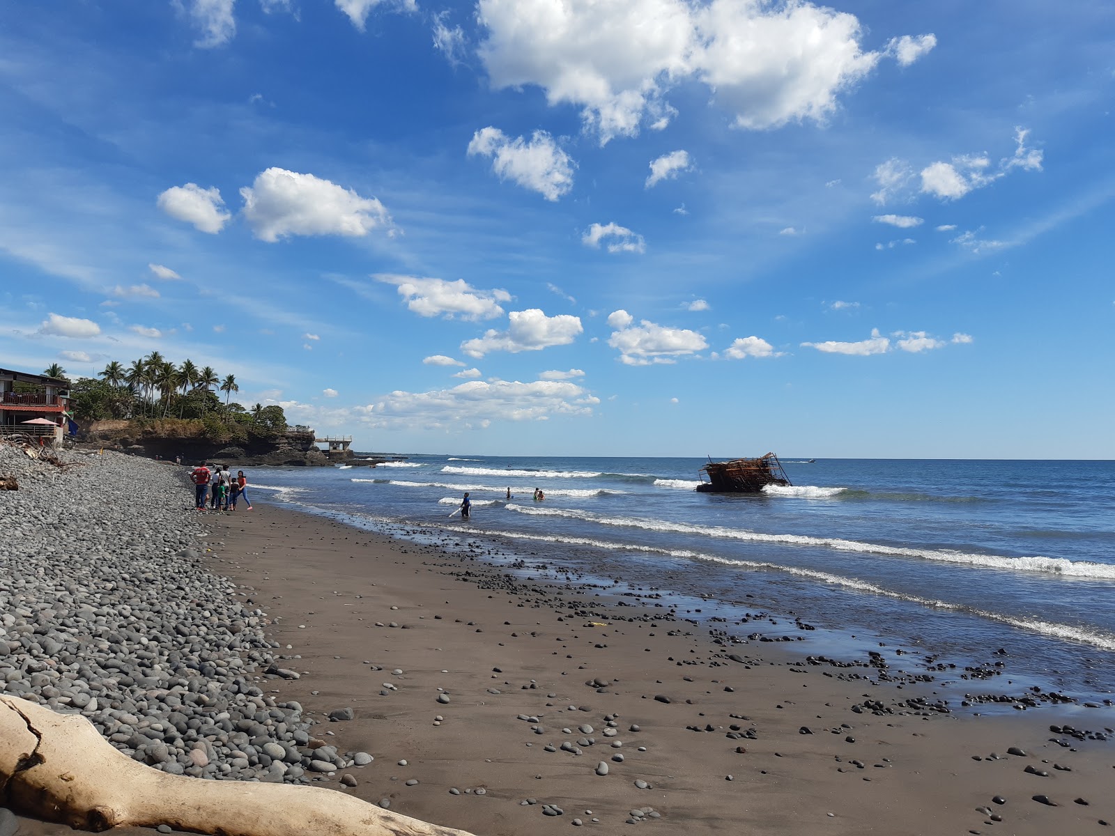 Foto af La Libertad beach med gråt sand og småsten overflade