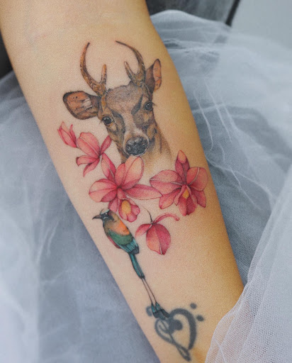 Explore basketball tattoo ideas, creative tattoo ideas in Orange, available at Baron Art Tattoo